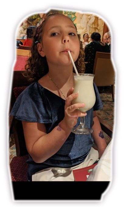 Gabi enjoying a creamy mocktail